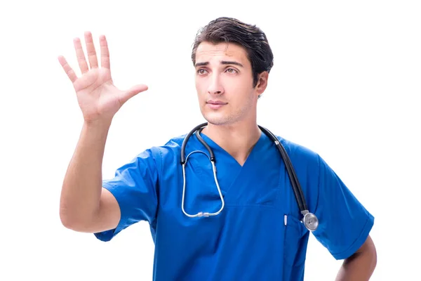 Joven médico masculino presionando botones aislados en blanco — Foto de Stock