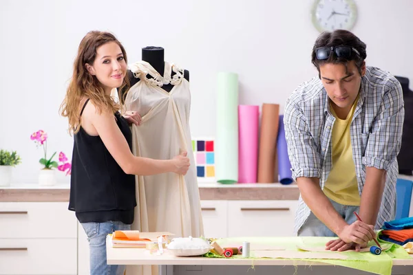 Young tailor working in his workshop — Stock Photo, Image