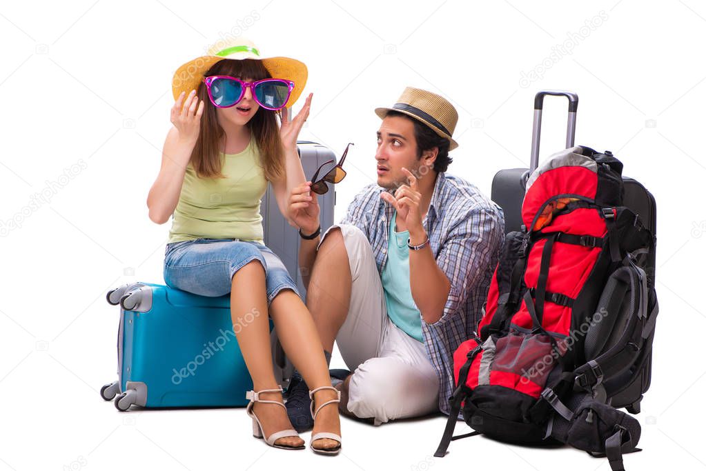 Young family preparing for vacation travel on white