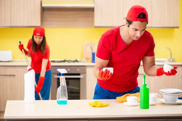 Cleaning professional contractors working at kitchen — Stock Photo, Image