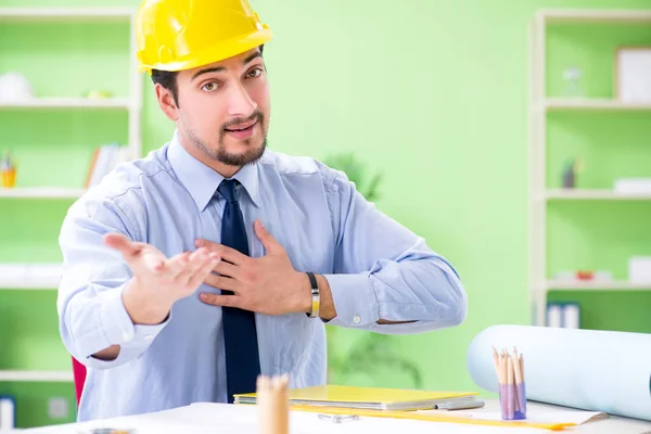 Young male architect working at the project — Stock Photo, Image