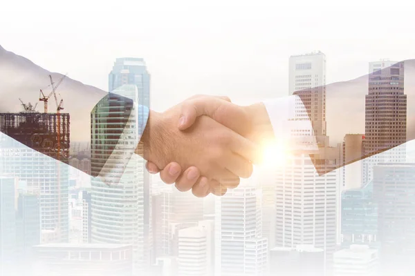 Concept of cooperation with handshake — Stock Photo, Image