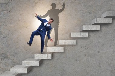 İş adamı ve iş konseptindeki gölgesi