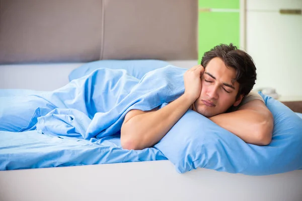 Man suffering from sleeping disorder and insomnia