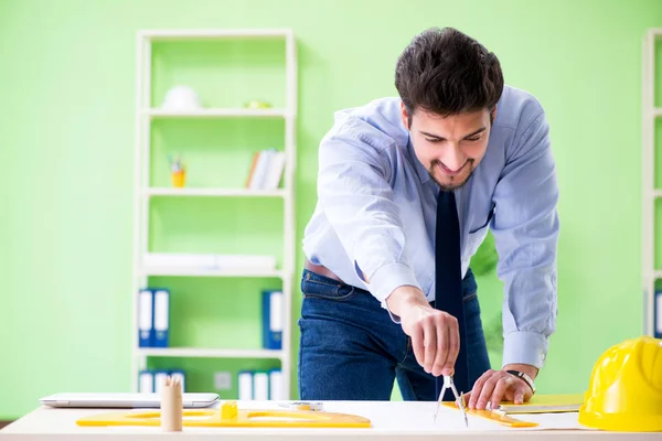 Young male architect working at the project — Stock Photo, Image