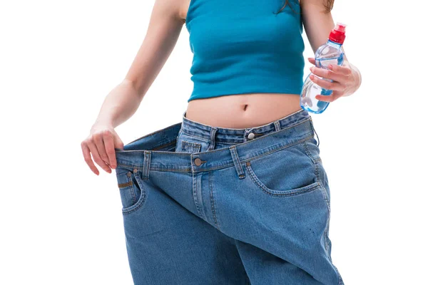 Concept of dieting with oversized jeans — Stock Photo, Image