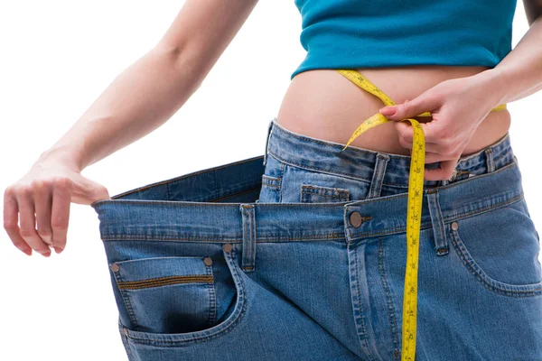 Concept of dieting with oversized jeans — Stock Photo, Image