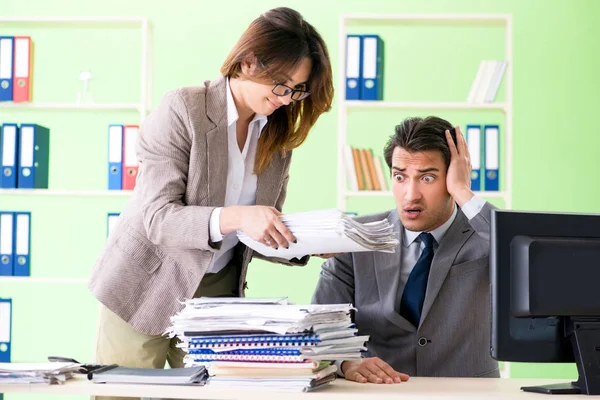 Man employee suffering from excessive work — Stock Photo, Image