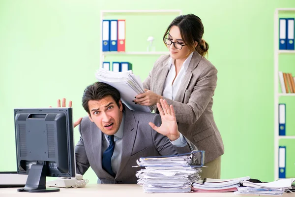 Man employee suffering from excessive work — Stock Photo, Image