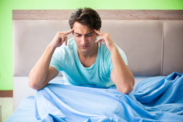 Man suffering from sleeping disorder and insomnia — Stock Photo, Image