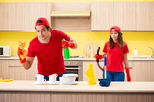 Cleaning professional contractors working at kitchen — Stock Photo, Image