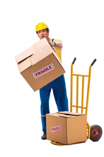 Junger Bauunternehmer mit fragilen Boxen auf weißem Grund — Stockfoto