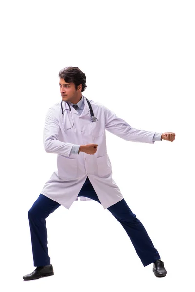 Νεαρός όμορφος γιατρός κάτω από πίεση απομονώνεται σε λευκό — Φωτογραφία Αρχείου