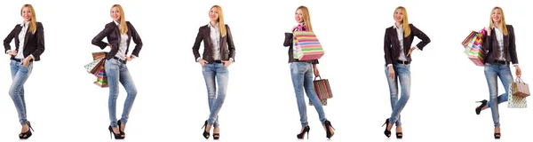 Beautiful woman with shopping bags isolated on white — Stock Photo, Image