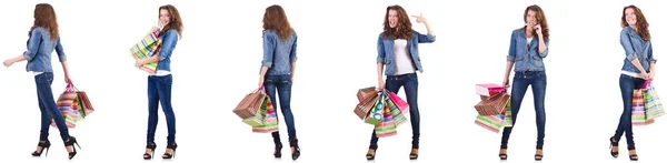 Young woman with shopping bags isolated on white — Stock Photo, Image