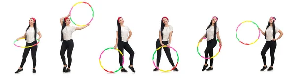 Ein Mädchen im Sportanzug mit Hula-Hoop-Reifen — Stockfoto