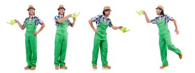 Genç, neşeli bahçıvan, sulu teneke kutusunu beyaza sarmış.