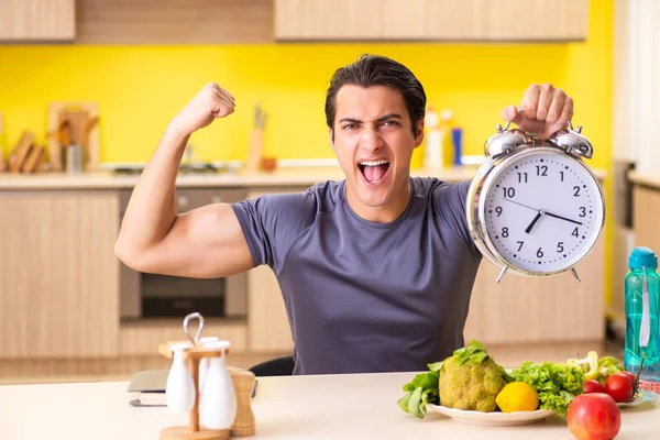 Young man in dieting and healthy eating concept — Stock Photo, Image