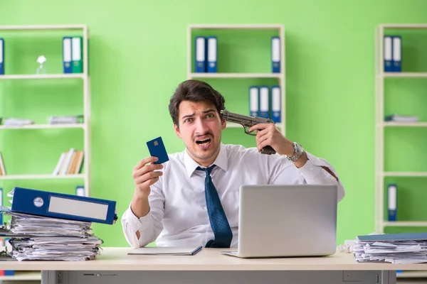 Despaired businessman thinking of suicide in the office — Stock Photo, Image