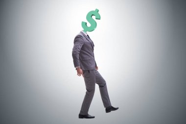 Kafası yerine dolar işareti olan bir iş adamı.