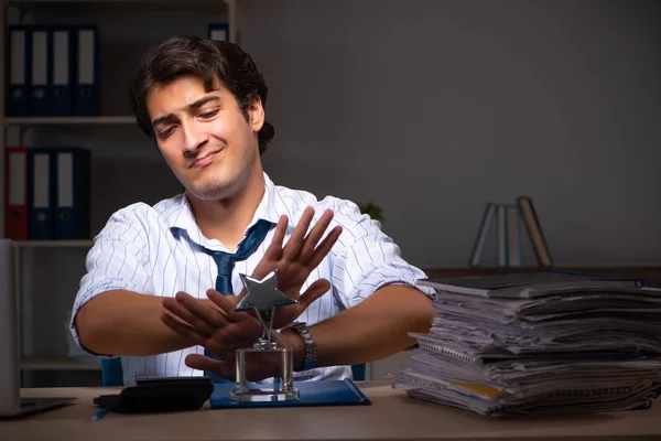 Young financial manager working late at night in office — Stock Photo, Image