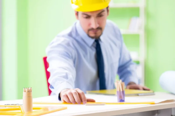 Young male architect working at the project — Stock Photo, Image