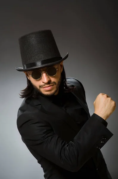 Vintage concept with man wearing black top hat — Stock Photo, Image