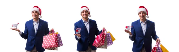 Joven con bolsos después de las compras de Navidad sobre fondo blanco —  Fotos de Stock