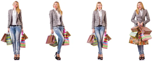 Beautiful woman with shopping bags isolated on white — Stock Photo, Image