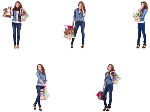 Jeune femme avec des sacs à provisions isolés sur blanc — Photo