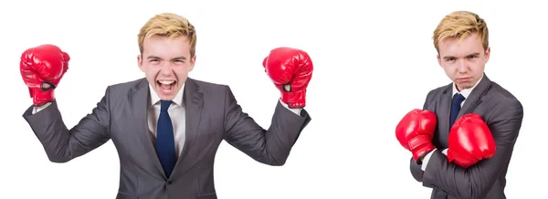 Empleado joven con guantes de boxeo aislados en blanco —  Fotos de Stock