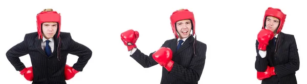 Jovem funcionário com luvas de boxe isolado em branco — Fotografia de Stock