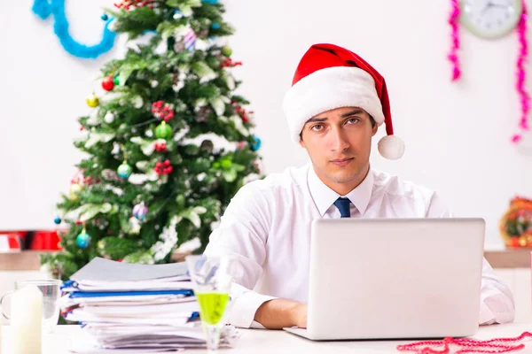 Employee businessman celebrating christmas in office Stock Image