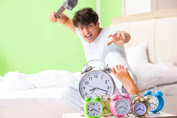 Young man having trouble waking up in early morning — Stock Photo, Image