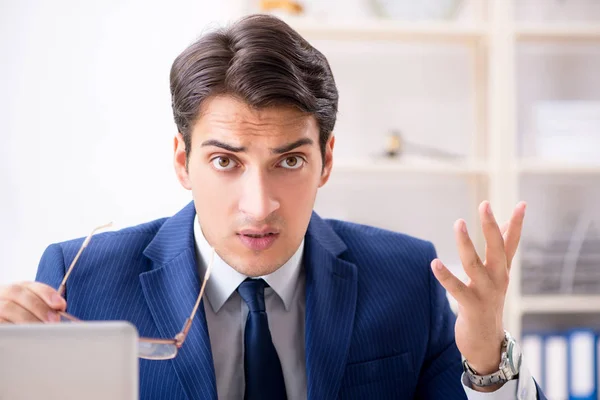 Busy man complaining about his workload — Stock Photo, Image