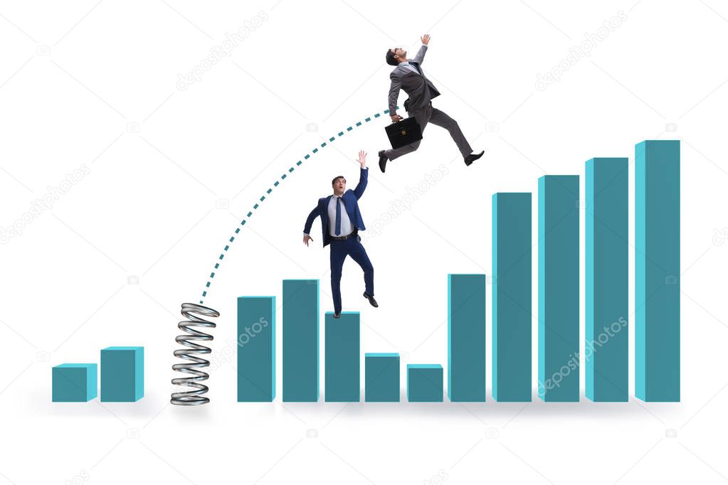 Businessman outperforming his competition jumping over