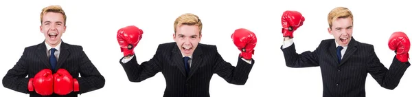 Jovem funcionário com luvas de boxe isolado em branco — Fotografia de Stock