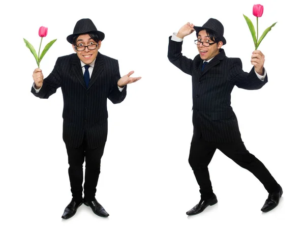 Jovem de traje preto com flor isolada em branco — Fotografia de Stock