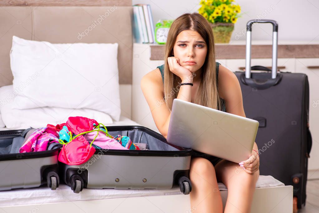 Young woman getting ready for summer vacation