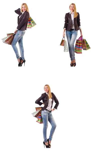 Mooie vrouw met boodschappentassen geïsoleerd op wit — Stockfoto