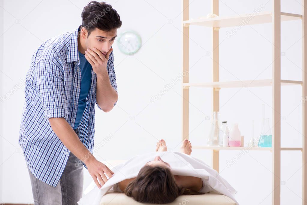 Man mourning his dead wife