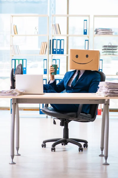 Happy man with box instead of his head — Stock Photo, Image