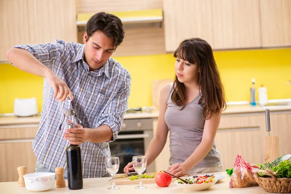 Young couple celebrating wedding anniversary at kitchen — Stock Photo, Image