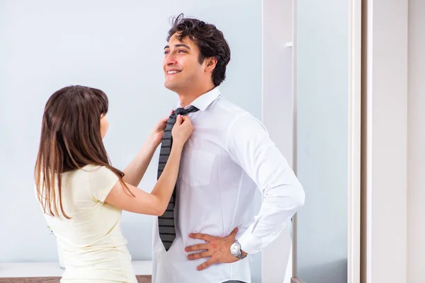 Woman sees her husband off to work — Stock Photo, Image