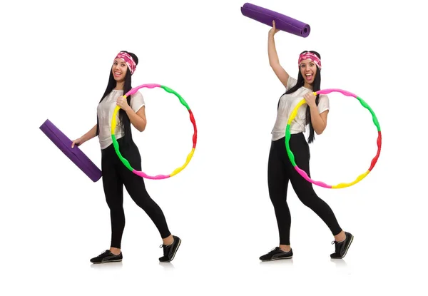 Una ragazza in tuta sportiva con hula hoop isolato su bianco — Foto Stock