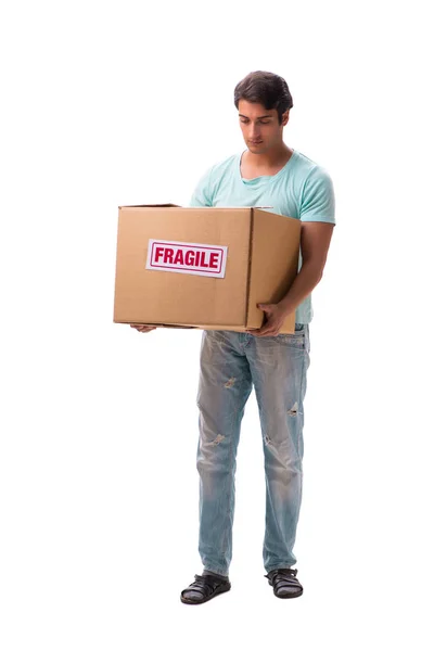 Young handsome man with fragile box ordered from Internet — Stock Photo, Image