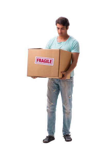 Young handsome man with fragile box ordered from Internet 