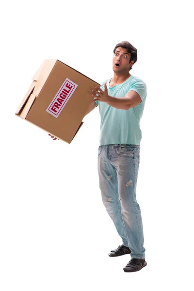 Mladý pohledný muž s křehkou krabicí objednané z internetu — Stock fotografie