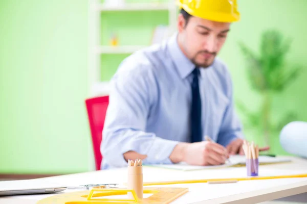 Young male architect working at the project — Stock Photo, Image