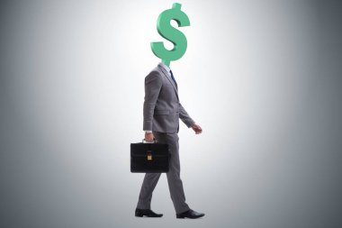 Kafası yerine dolar işareti olan bir iş adamı.
